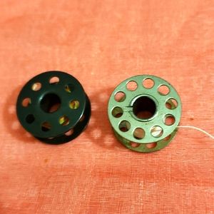 2 vintage bobbin case